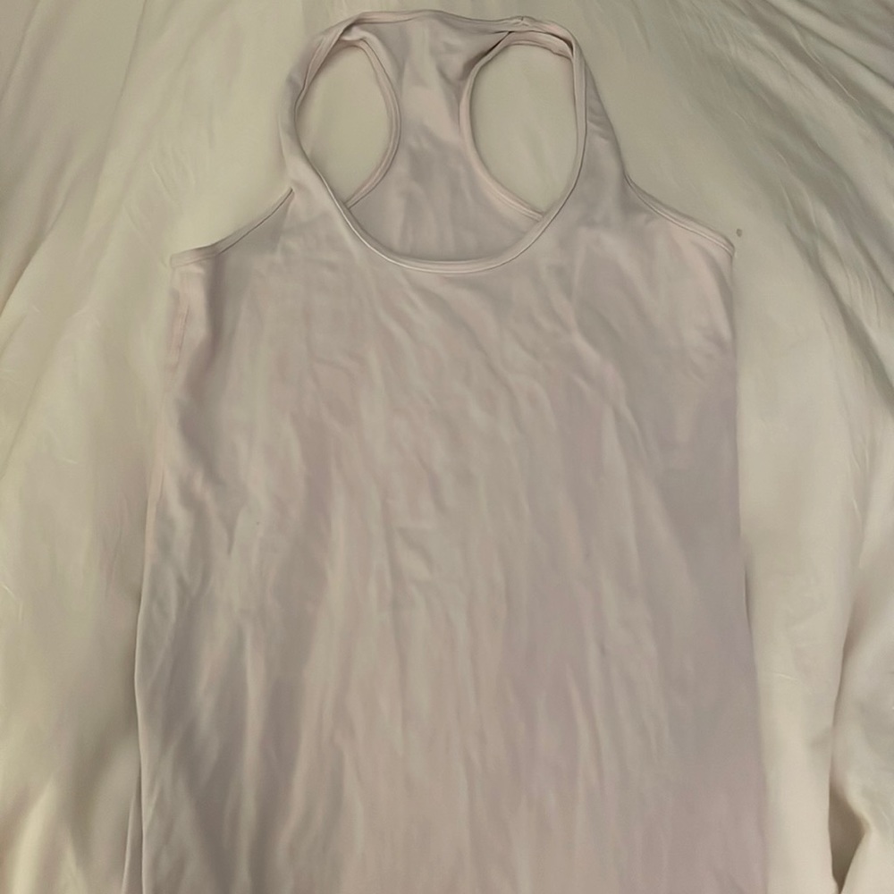 Lululemon light pink racer back tank top. Size small